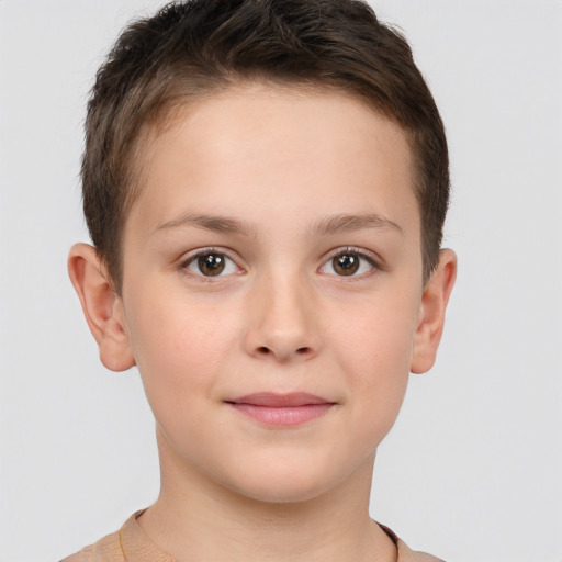 Joyful white child female with short  brown hair and brown eyes