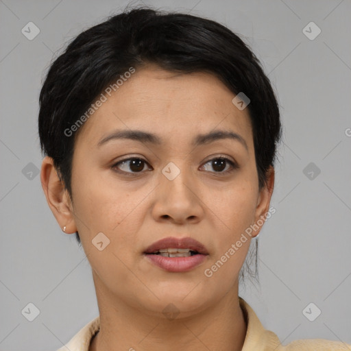 Joyful asian young-adult female with short  black hair and brown eyes