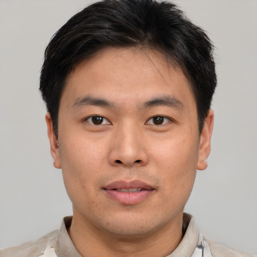 Neutral asian young-adult male with short  brown hair and brown eyes