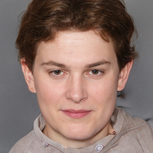 Joyful white young-adult male with short  brown hair and blue eyes