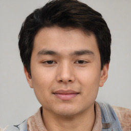 Neutral asian young-adult male with short  brown hair and brown eyes