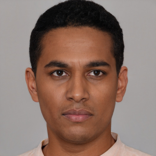 Neutral latino young-adult male with short  black hair and brown eyes