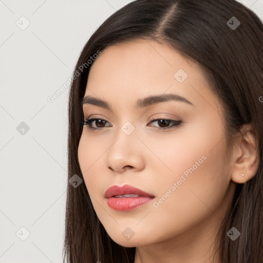 Neutral white young-adult female with long  brown hair and brown eyes