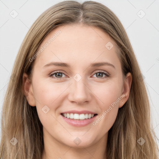 Joyful white young-adult female with long  brown hair and grey eyes