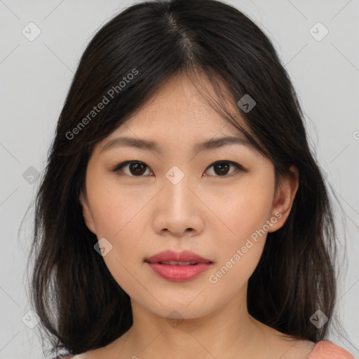 Neutral asian young-adult female with medium  brown hair and brown eyes