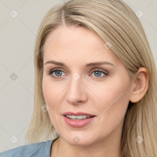 Joyful white young-adult female with long  brown hair and grey eyes