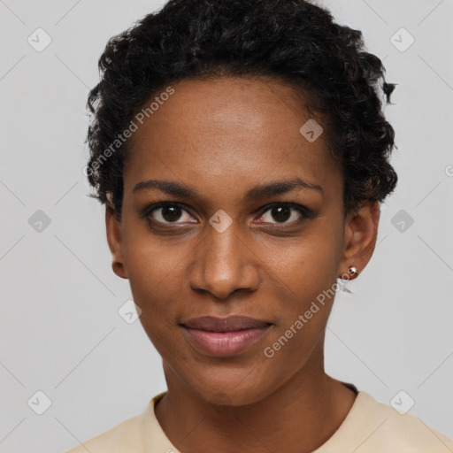 Joyful black young-adult female with short  black hair and brown eyes