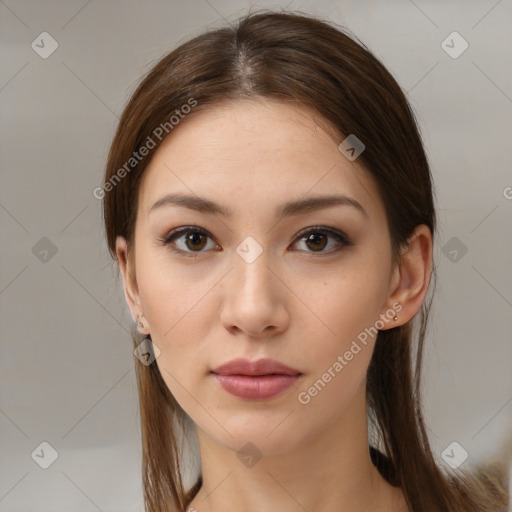 Neutral white young-adult female with long  brown hair and brown eyes