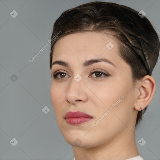 Joyful white young-adult female with medium  brown hair and brown eyes