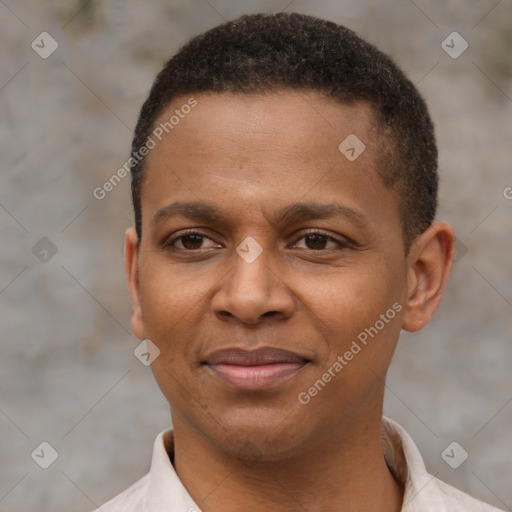 Joyful latino young-adult male with short  brown hair and brown eyes