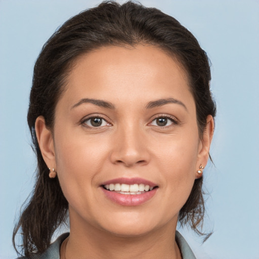 Joyful white young-adult female with medium  brown hair and brown eyes