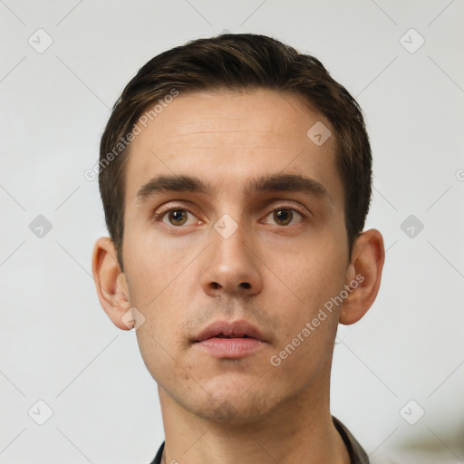 Neutral white young-adult male with short  brown hair and brown eyes