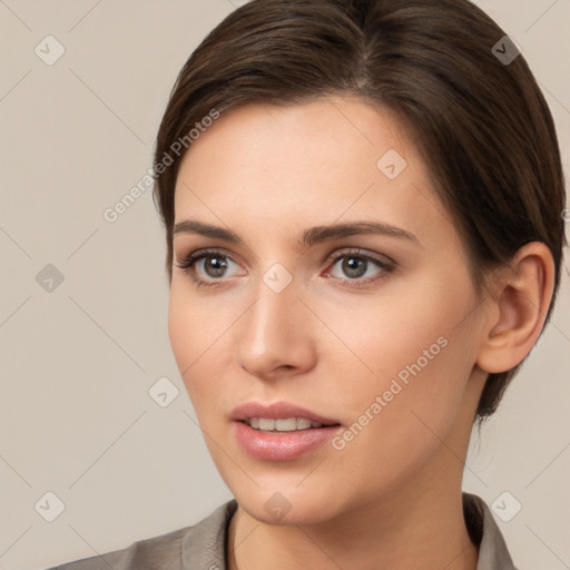 Neutral white young-adult female with medium  brown hair and brown eyes