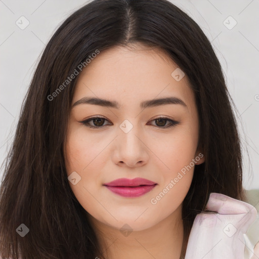 Joyful asian young-adult female with long  brown hair and brown eyes