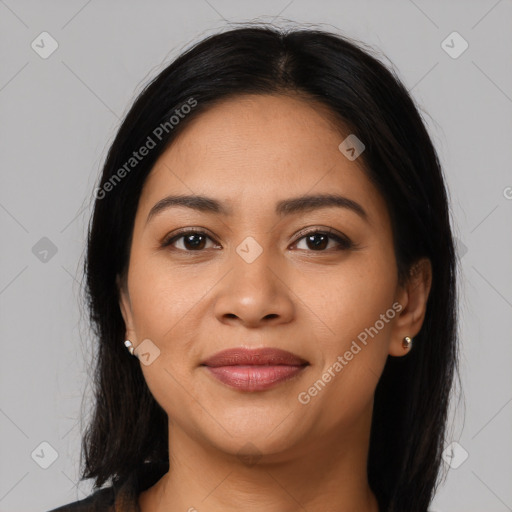 Joyful latino young-adult female with long  black hair and brown eyes