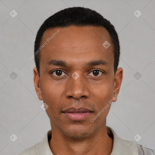 Neutral latino young-adult male with short  black hair and brown eyes