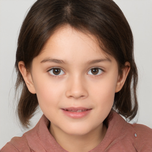 Joyful white child female with medium  brown hair and brown eyes