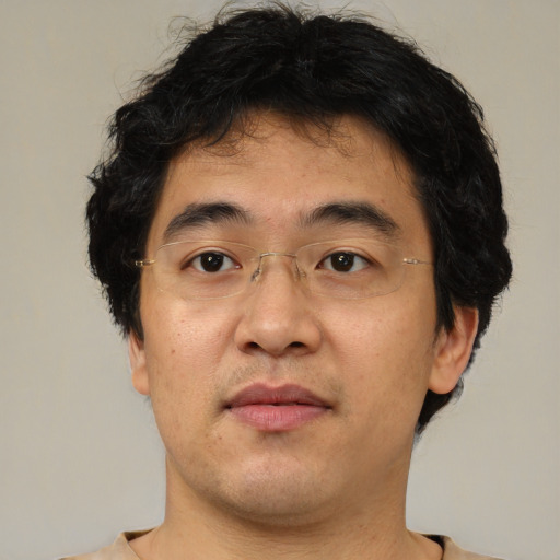 Neutral asian adult male with short  brown hair and brown eyes