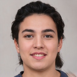 Joyful white young-adult male with medium  brown hair and brown eyes