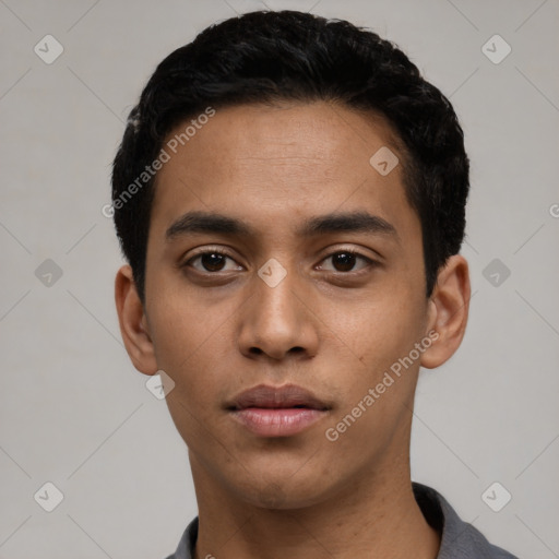 Neutral latino young-adult male with short  black hair and brown eyes