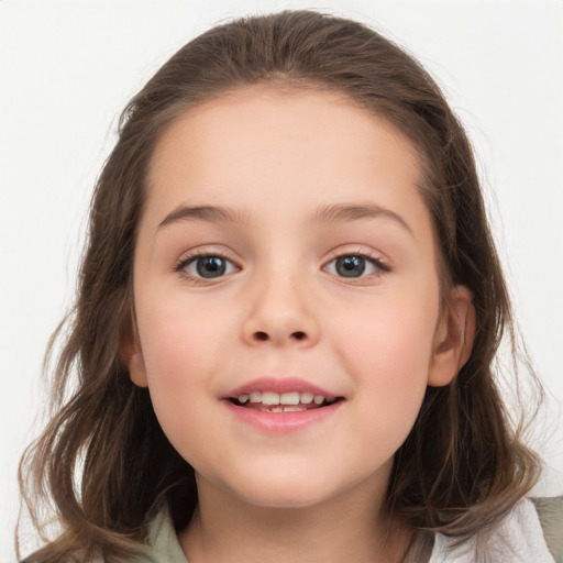 Joyful white child female with medium  brown hair and brown eyes