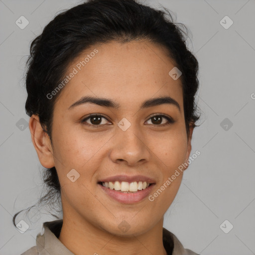 Joyful latino young-adult female with short  brown hair and brown eyes