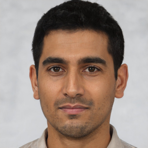 Neutral latino young-adult male with short  black hair and brown eyes