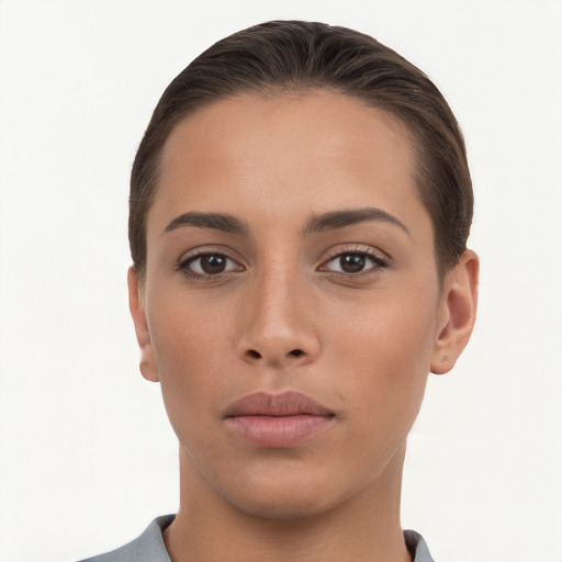 Neutral white young-adult female with short  brown hair and brown eyes