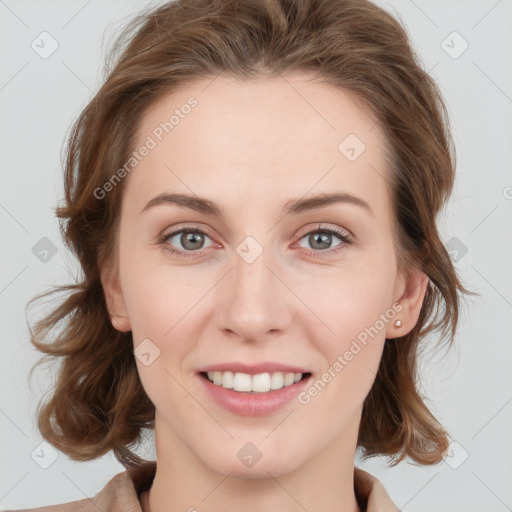 Joyful white young-adult female with medium  brown hair and blue eyes