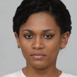 Neutral black young-adult female with short  black hair and brown eyes