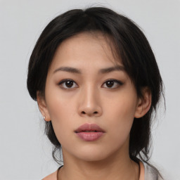 Neutral asian young-adult female with medium  black hair and brown eyes