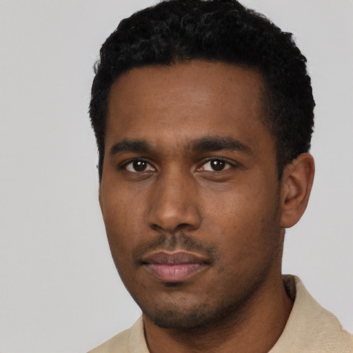 Neutral black young-adult male with short  black hair and brown eyes