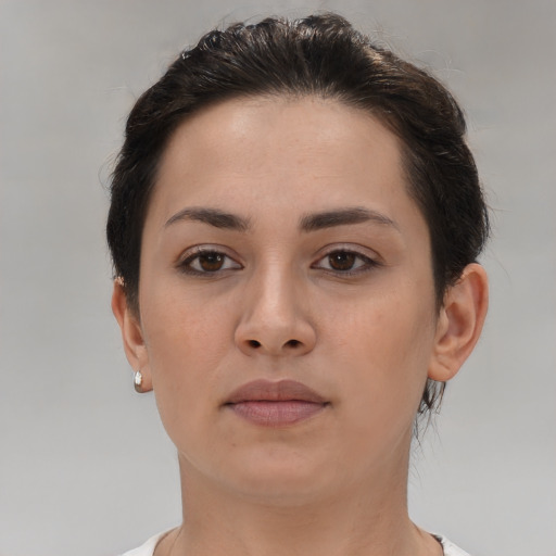 Neutral white young-adult female with short  brown hair and brown eyes