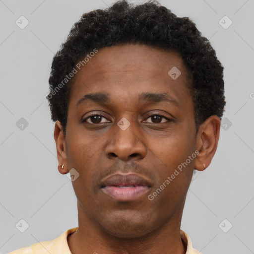 Neutral black young-adult male with short  brown hair and brown eyes