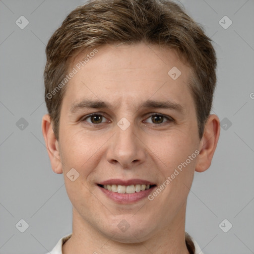 Joyful white young-adult male with short  brown hair and brown eyes