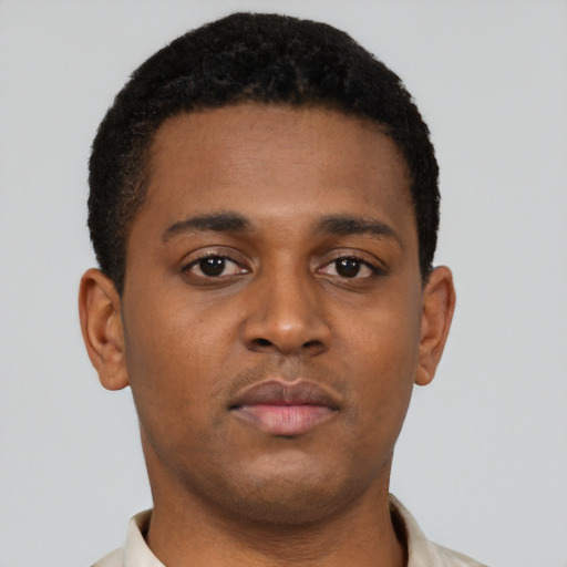 Neutral black young-adult male with short  brown hair and brown eyes