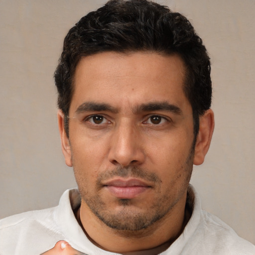 Neutral white young-adult male with short  black hair and brown eyes