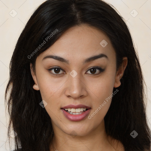 Joyful latino young-adult female with long  brown hair and brown eyes