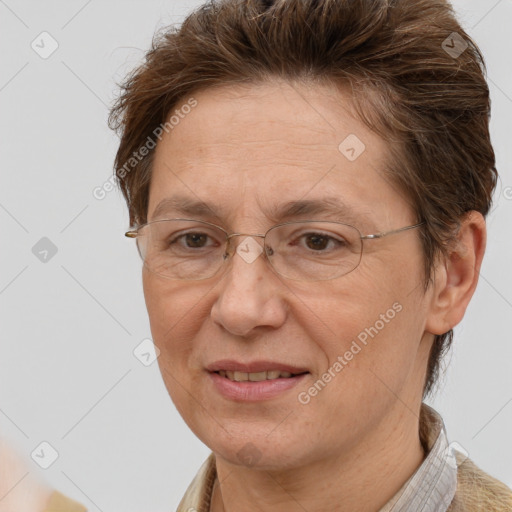 Joyful white adult female with short  brown hair and brown eyes