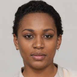 Neutral black young-adult female with short  brown hair and brown eyes