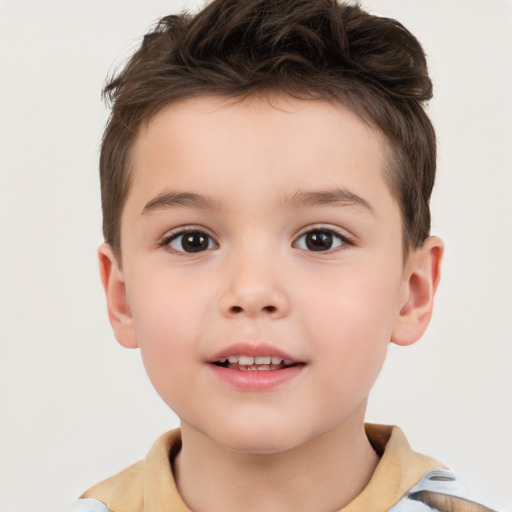 Joyful white child male with short  brown hair and brown eyes