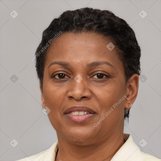 Joyful latino adult female with short  brown hair and brown eyes