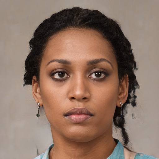 Neutral latino young-adult female with short  black hair and brown eyes