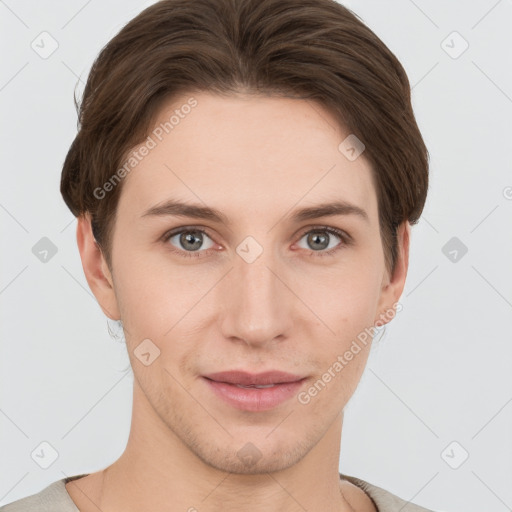 Joyful white young-adult female with short  brown hair and grey eyes