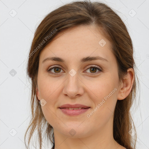 Joyful white young-adult female with long  brown hair and grey eyes