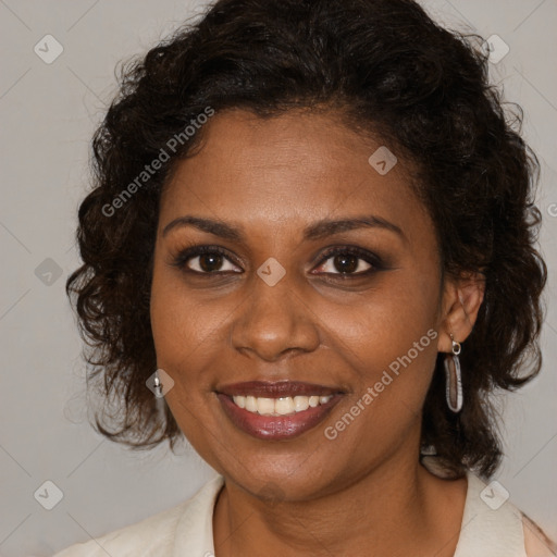 Joyful black young-adult female with medium  brown hair and brown eyes