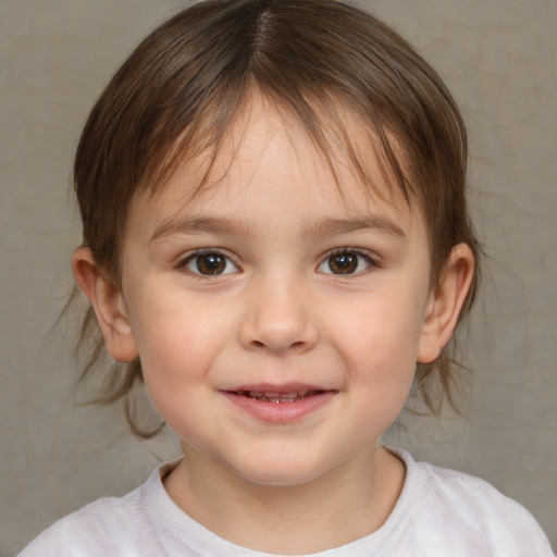 Joyful white child female with medium  brown hair and brown eyes