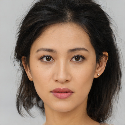 Neutral asian young-adult female with medium  brown hair and brown eyes