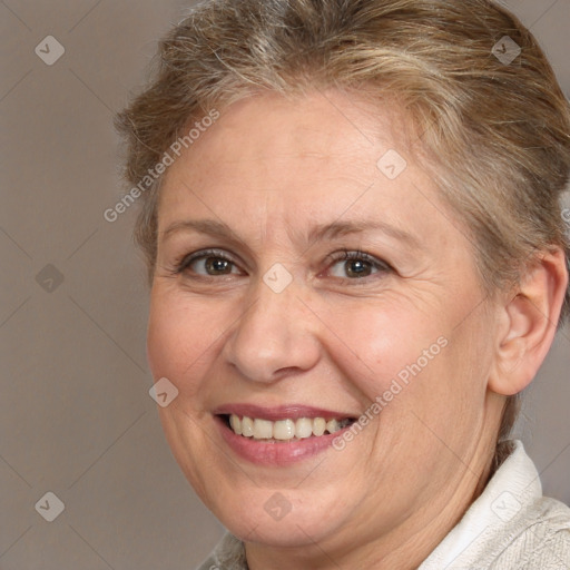 Joyful white middle-aged female with short  brown hair and brown eyes