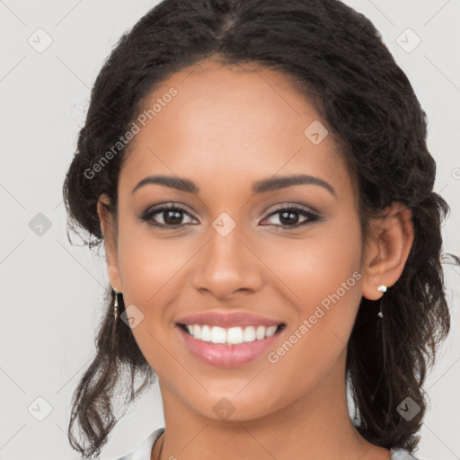 Joyful latino young-adult female with long  brown hair and brown eyes